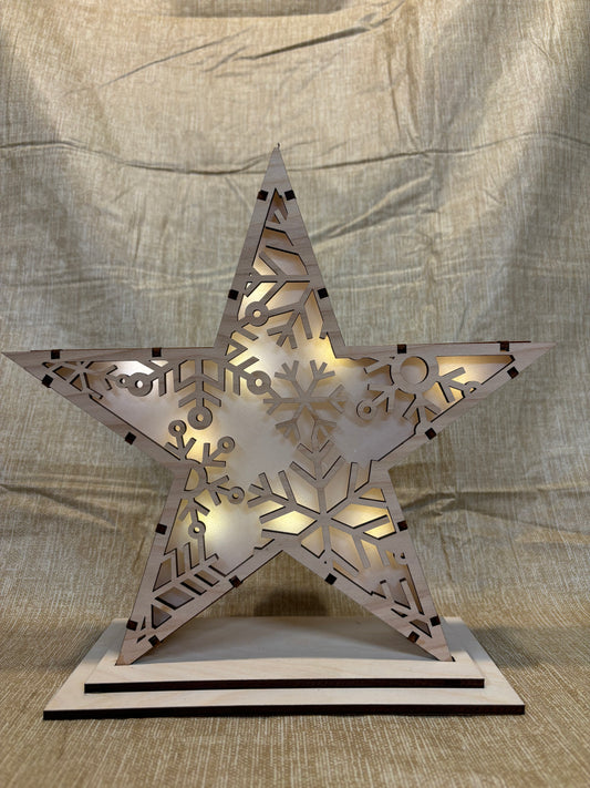 Lighted star shelf sitter